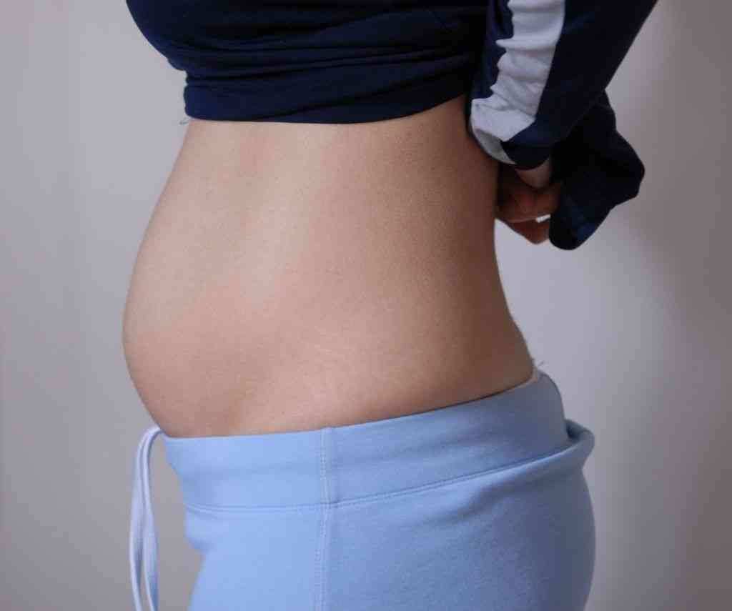 Живот на третьем месяце беременности